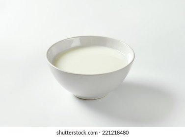 Bowl Of Milk On White Background