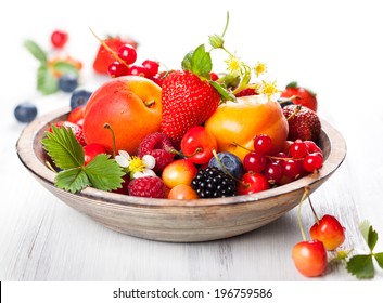 Bowl Of Mixed Berries On The Table