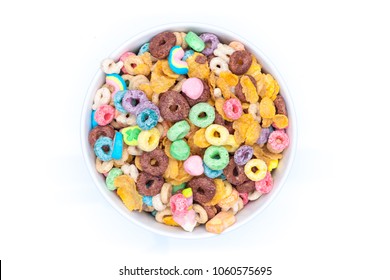 Bowl of mixed cereals,chocolate,corn flex,honey rings, and marshmallows  on white background. Isolated top view. - Powered by Shutterstock