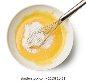 bowl of mixed egg yolks and sugar with corn starch for making custard cream isolated on white background, top view - Powered by Shutterstock