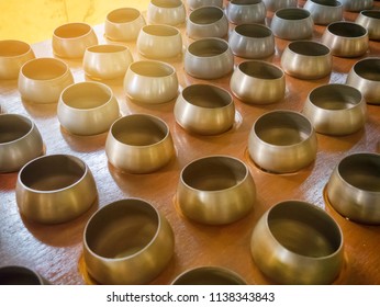 Bowl Of Monk Placed On Countless Tables. It Is For Buddhists To Make Merit. For Coin Down The Ceremony Is Based On Faith.