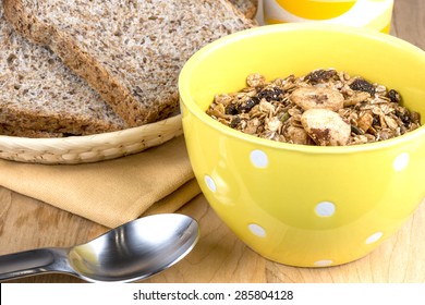 A Bowl Of Muesli Cereal And High Fiber Bread