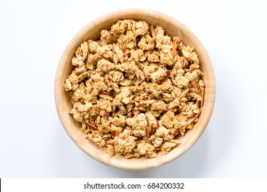 Bowl Of Muesli And Granola Isolated On White Top View.