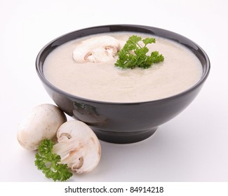 Bowl Of Mushroom Soup Isolated On White