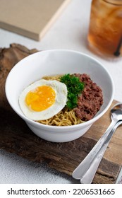 A Bowl Nodle With Egg And Beef