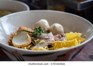 Bowl Of Noodles With Meat Balls And Crispy Wonton