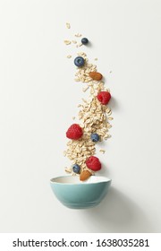 Bowl Of Oatmeal, Almond And Berries On White Background, Top View