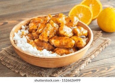 Bowl Of Orange Chicken With White Rice