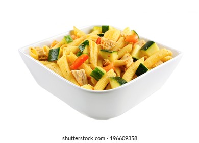 Bowl Of Pasta Salad With Vegetables And Chicken Isolated On White