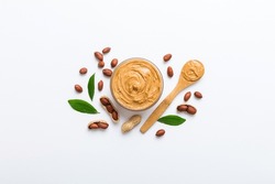 Bowl Of Peanut Butter And Peanuts On Table Background. Top View With Copy Space. Creamy Peanut Pasta In Small Bowl.