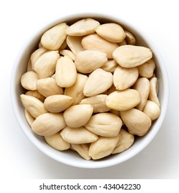 Bowl Of Peeled Whole Almonds Isolated On White From Above.