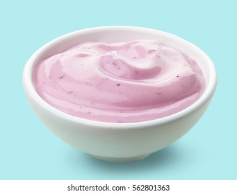 Bowl Of Pink Fruit Yogurt On Blue Background