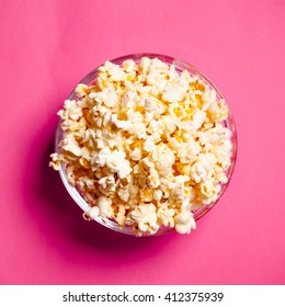 Bowl With Popcorn On Red Background