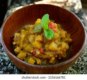 A Bowl Of Potato And Capsicum Curry