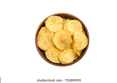 Bowl with potato chips isolated on white. Top view.
