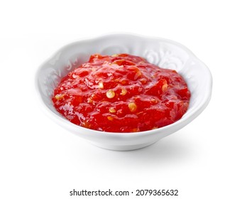 Bowl Of Red Hot Chili Pepper Sauce Isolated On White Background