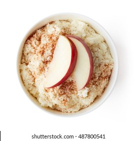 Bowl Of Rice Flakes Porridge With Apple Slices And Cinnamon Isolated On White Background, Top View