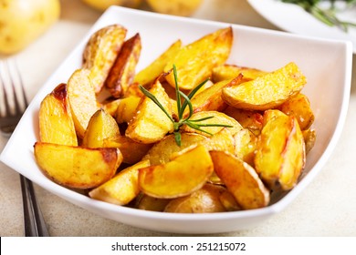 Bowl Of Roasted Potatoes With Rosemary