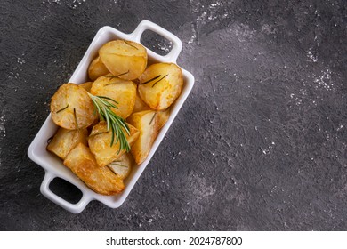 Bowl Of Rustic Fried And Roasted Potatoes With Rosemary