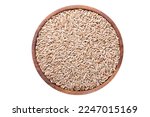 Bowl of rye grains isolated on white background, top view