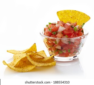 Bowl Of Salsa Dip And Nachos Isolated On White Background