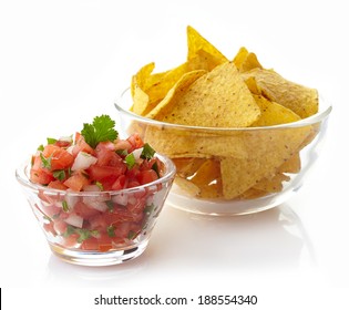 Bowl Of Salsa Dip And Nachos Isolated On White Background