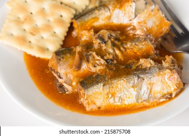 Bowl Of Sardines In Spicy Louisiana Hot Sauce With Old-fashioned Saltine Crackers.