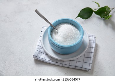Bowl And Scoop With White Sugar On Wooden Background. Food Catalog