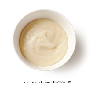 Bowl Of Semolina Porridge Isolated On White Background, Top View