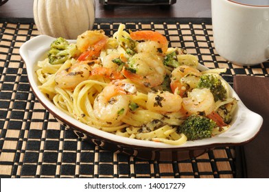 A Bowl Of Shrimp Scampi And Linguine With Broccoli