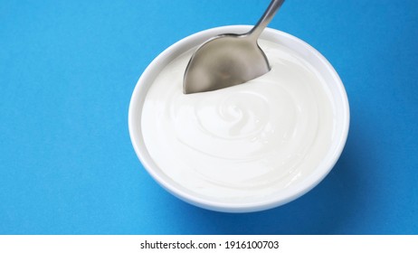 Bowl Of Sour Cream, Greek Yogurt With Spoon