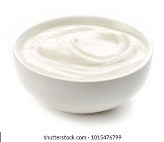 bowl of sour cream yogurt isolated on white background