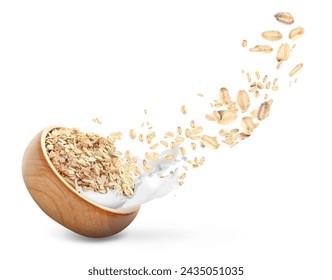 Bowl with splashes of milk and flying rolled oats on white background - Powered by Shutterstock