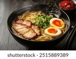 A Bowl of Steaming Ramen with Pork and Eggs