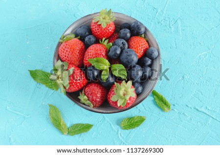 Similar – Image, Stock Photo Bowl of strawberries, blueberries and mint leaves