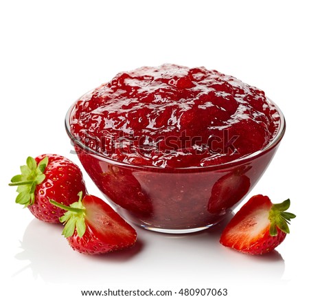 Bowl of strawberry jam isolated on white background