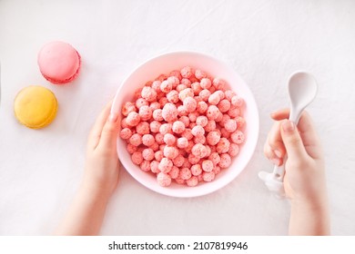 Bowl With Strawberry Sweet Corn Balls. Delicious And Healthy Breakfast Cereal. Kid Hand Take A Spoon And Eating