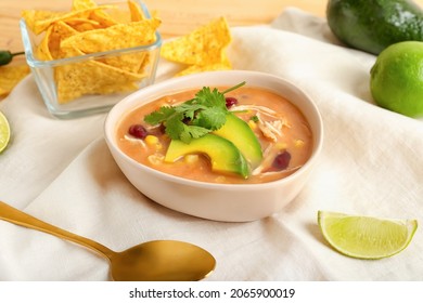 Bowl Of Tasty Chicken Enchilada Soup On Table