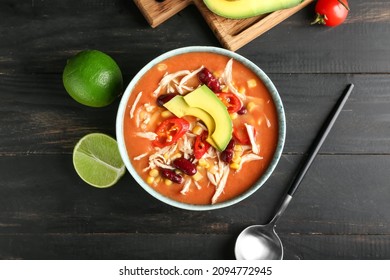 Bowl Of Tasty Chicken Enchilada Soup On Table