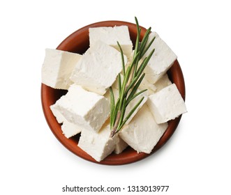 Bowl with tasty feta cheese on white background