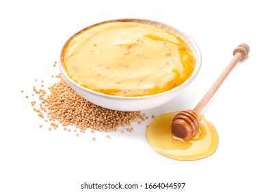 Bowl Of Tasty Honey Mustard Sauce On White Background