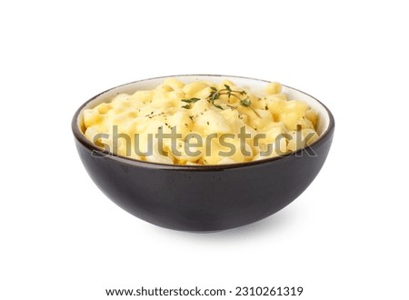 Bowl of tasty Italian pasta with Cheddar cheese on white background