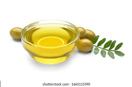 Bowl Of Tasty Olive Oil On White Background