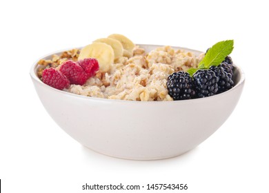 Bowl With Tasty Sweet Oatmeal On White Background