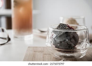 Bowl Of Tofu Based Ice Cream With Black Sesame Seed. Plant Based An Fully Vegan