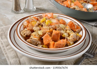 A Bowl Of Turkey And Sweet Potato Hash