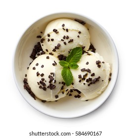 Bowl Of Vanilla Ice Cream And Chocolate Chips Isolated On White Background. From Top View