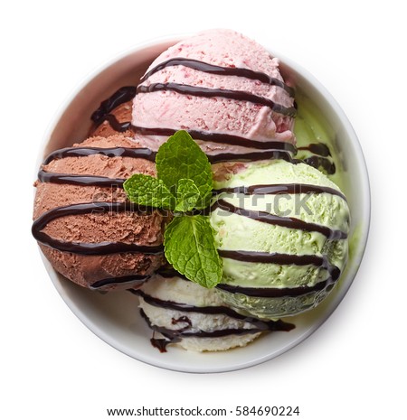 Bowl of various colorful ice cream and chocolate sauce isolated on white background. From top view