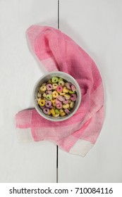 Bowl Of Various Froot Loops In Bowl On Wooden Table