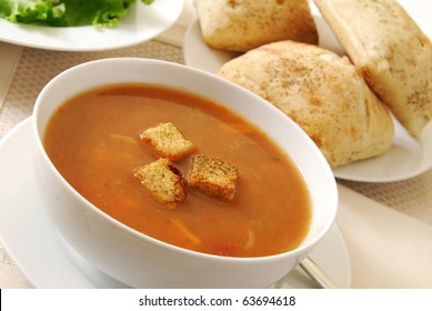 A Bowl Of Vegetable Beef Soup With Barley